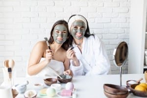 two beautiful women applying facial mask having fu 2023 11 27 05 29 22 utc