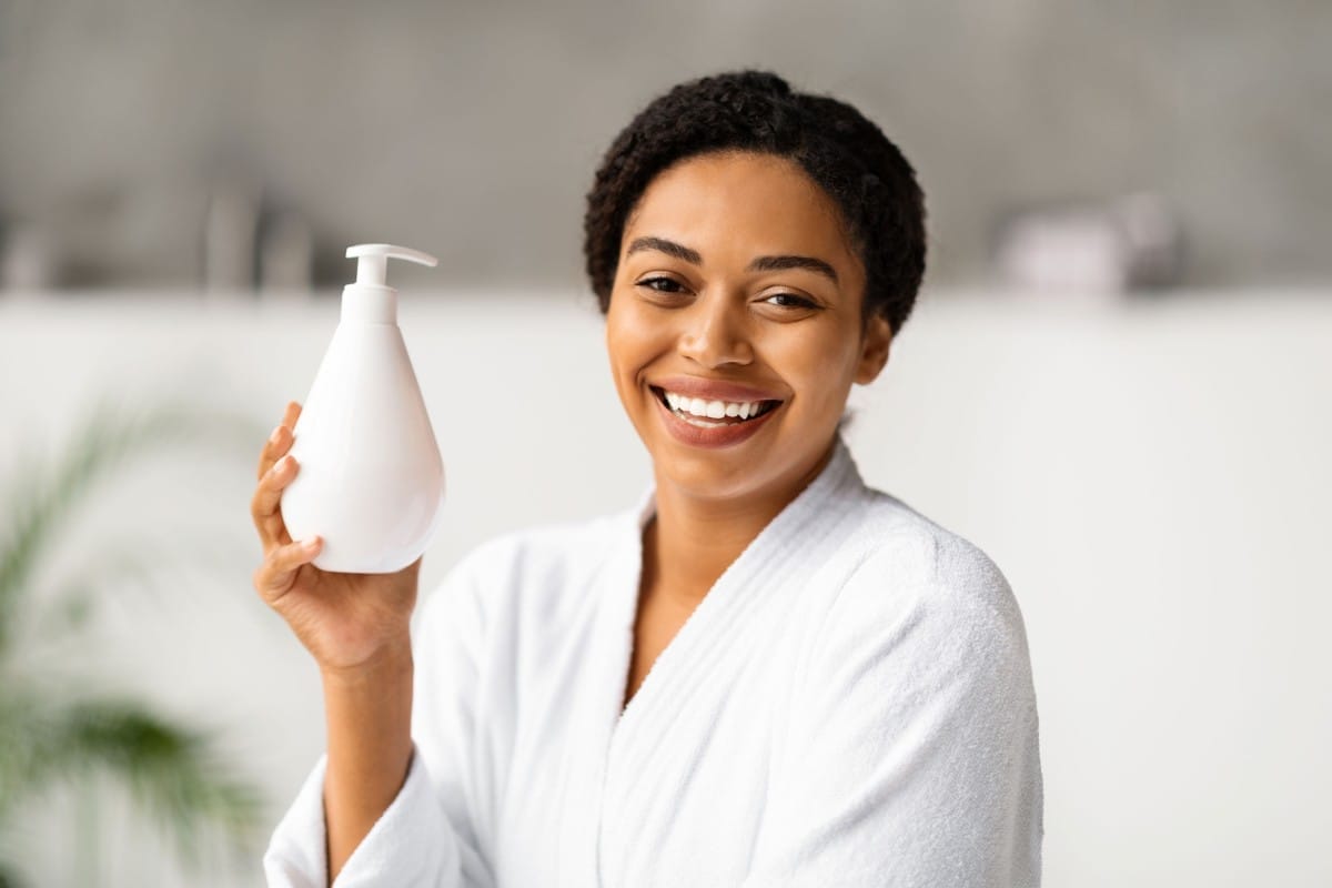 beautiful smiling black woman in bathrobe holding 2024 03 13 18 38 20 utc