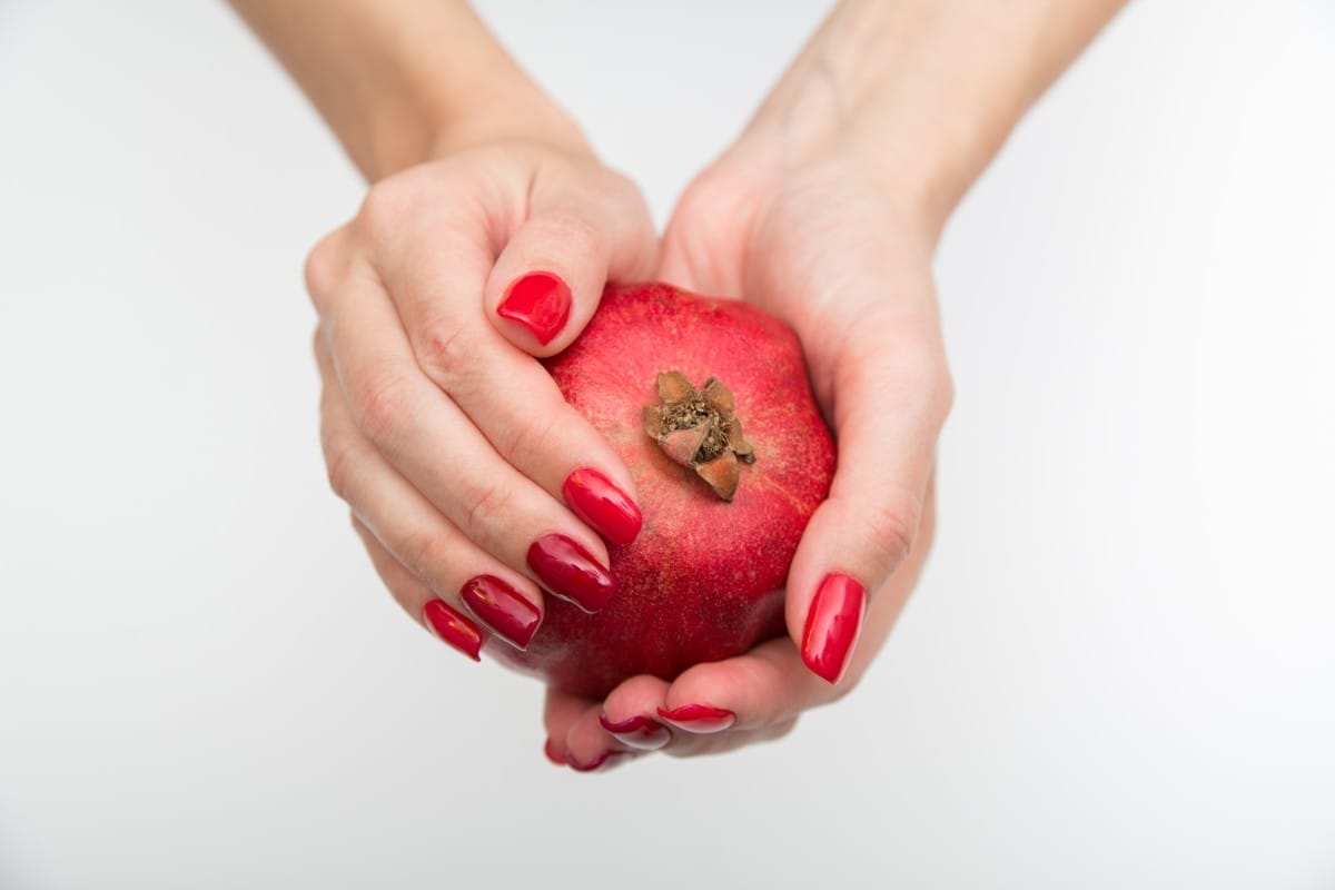 pomegranate isolated on a white background female 2023 11 27 05 07 57 utc