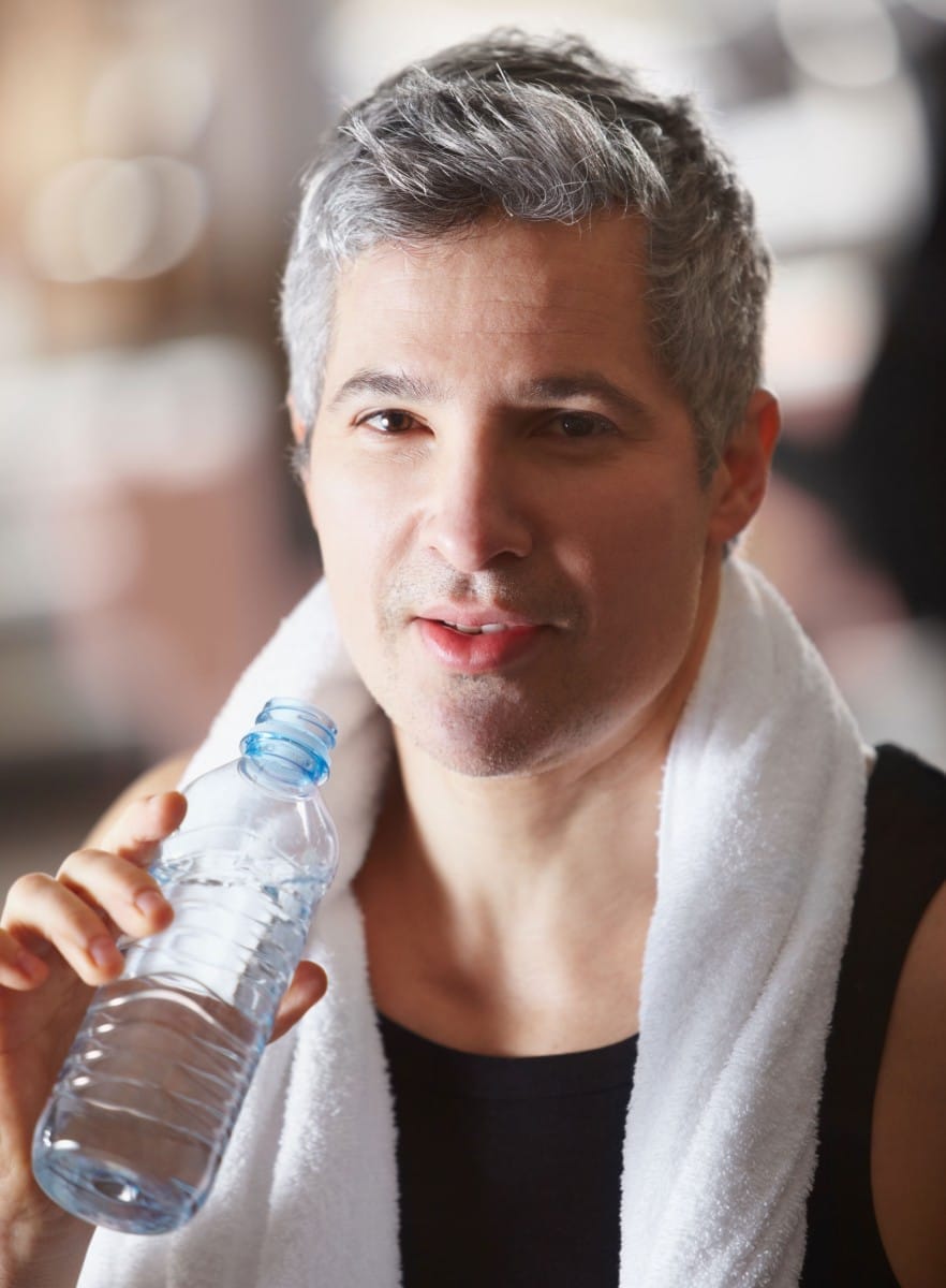 portrait of a mature man drinking from a water bot 2023 11 27 04 52 45 utc