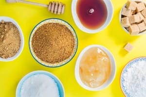 different kinds of sugar and sweeteners in the bowls