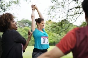 group of diverse athlete are stretching their muscle