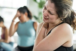 woman having problems with her shoulder