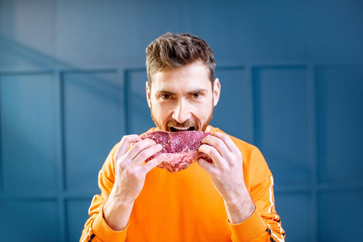 portrait of a man with meat steak 2023 11 27 05 24 45 utc