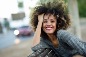 young black woman with afro hairstyle smiling in u 2023 11 27 04 56 11 utc