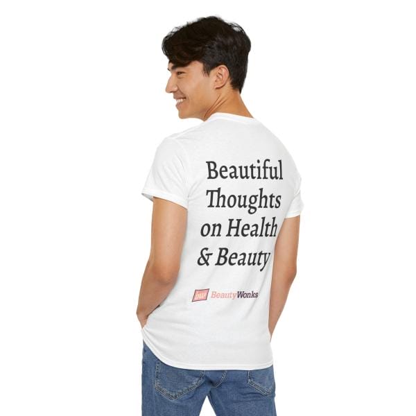 Man wearing white T-shirt with health and beauty slogan