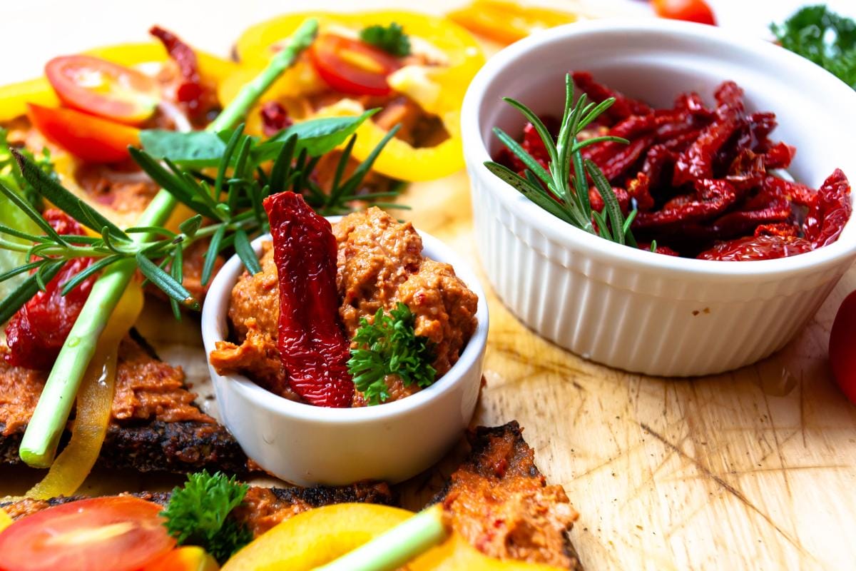 Colorful Mediterranean vegan meal with sundried tomatoes