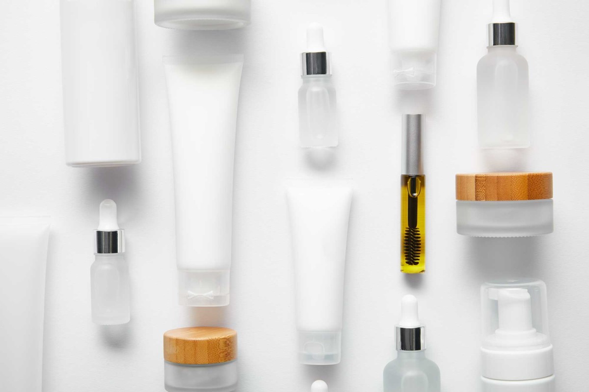 Assorted skincare products on white background