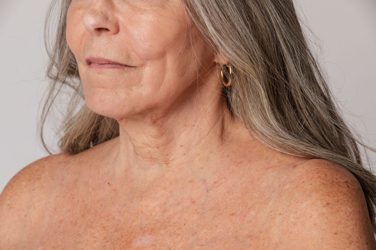 Close-up of elderly woman's face, showcasing natural aging.