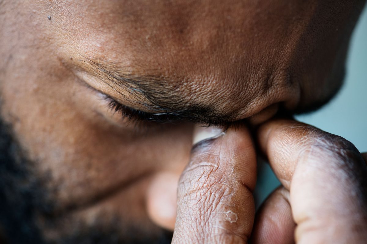 Close-up of a person's thoughtful expression